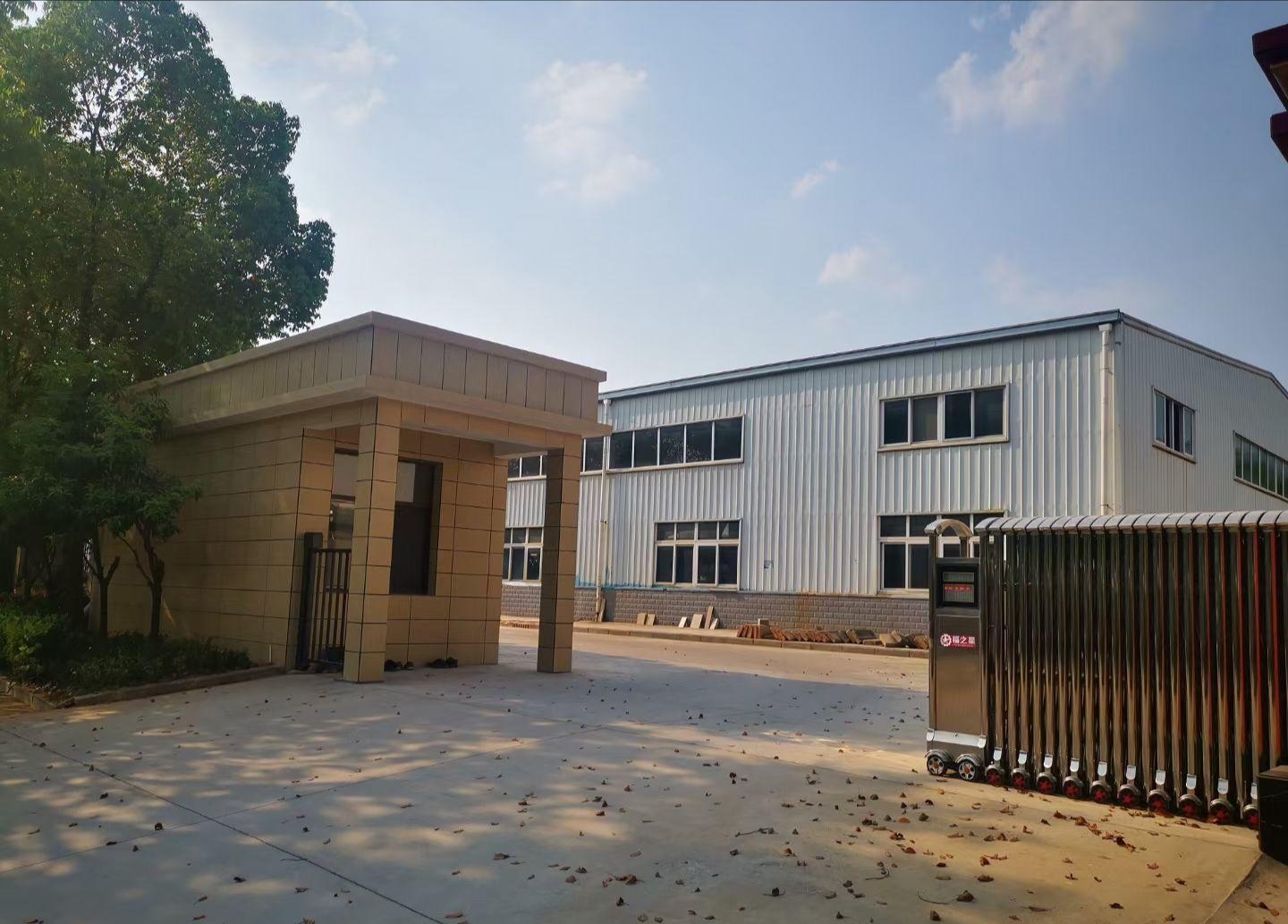 Liuyu Seats factory exterior in Huangshi, Hubei, showing the entrance and workshop building