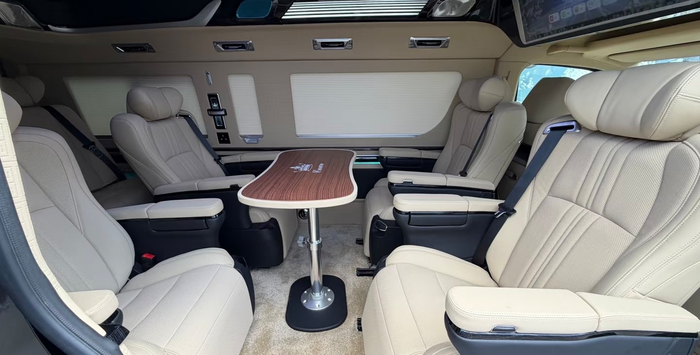 Face-to-face passenger seats and central table reference
